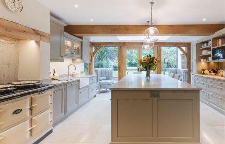 Interior of modern and kitchen with large spherical lighting and timber frames