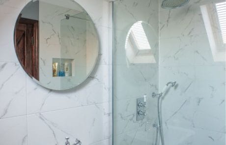 Modern bathroom with marble-effect walls